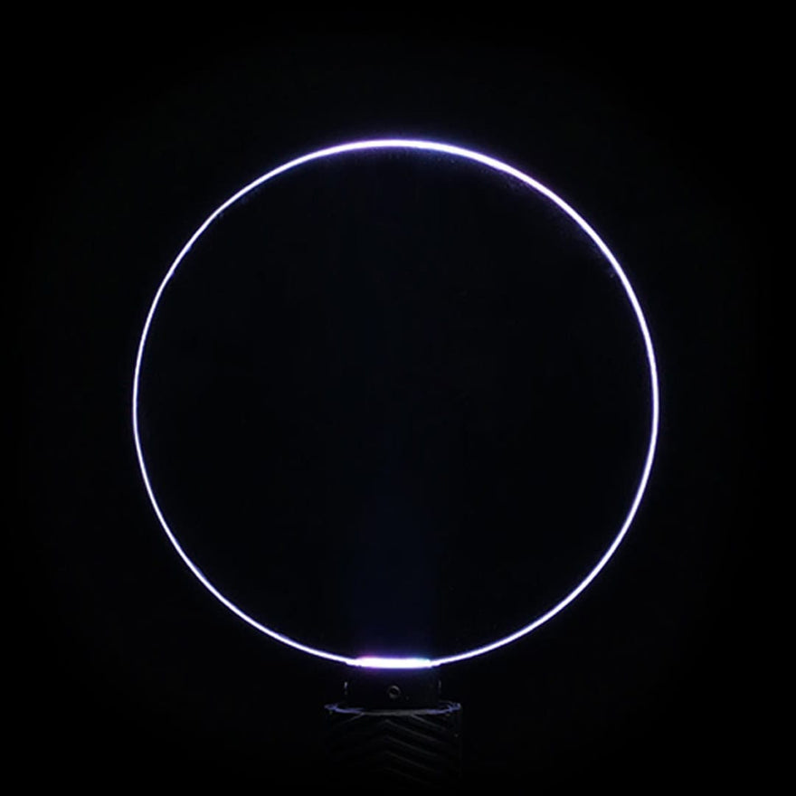 Circle acrylic light painting blade creating glowing circular trails in long exposure photography