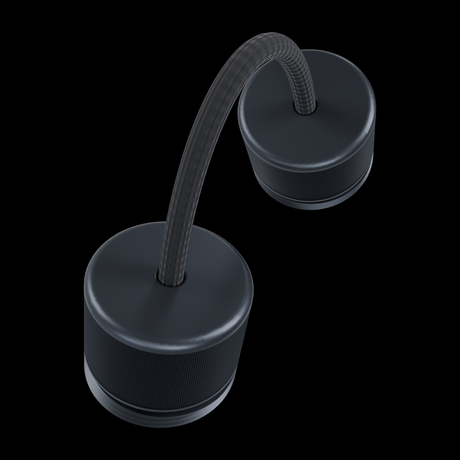 The paracord enters each connector cap through the end wall, knotted inside