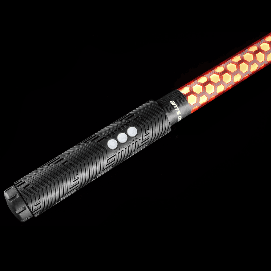 Close-up of the Honeycomb Saber Accessory in orange connected to an RGB Critter BT flashlight, showing texture and build details for flow arts, light painting, and festivals like Burning Man.