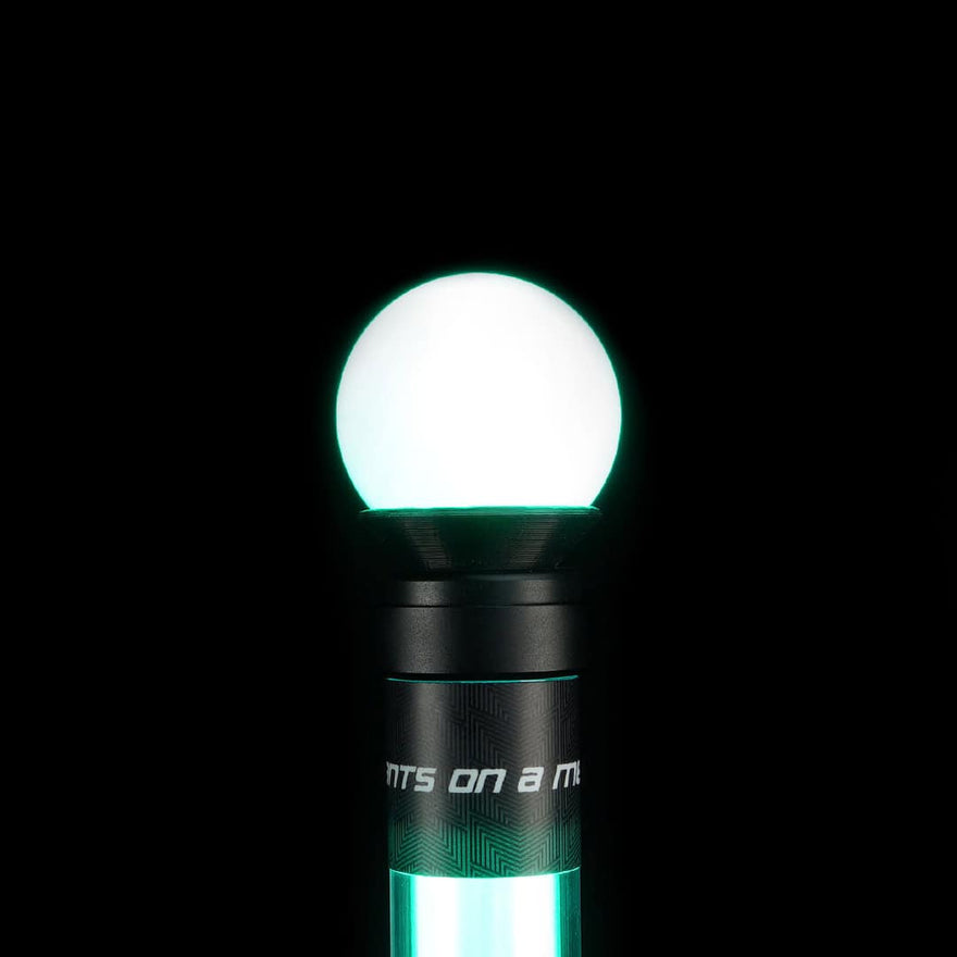 Light Painting Tube glowing green with a white orb diffuser on top