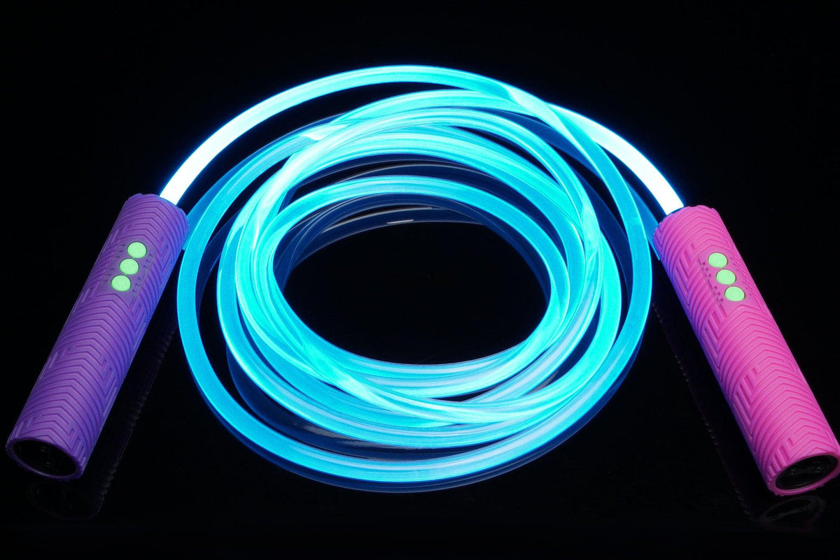 LED jump rope lit blue, with an RGB Critter BT light in each handle