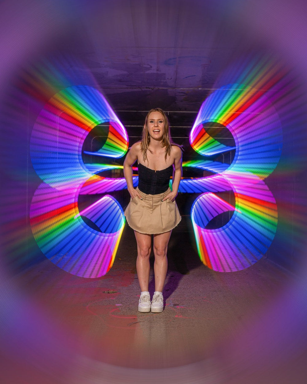 Beginner flow artist with rainbow pixel whip light trails. Photo: Stephen Knight.