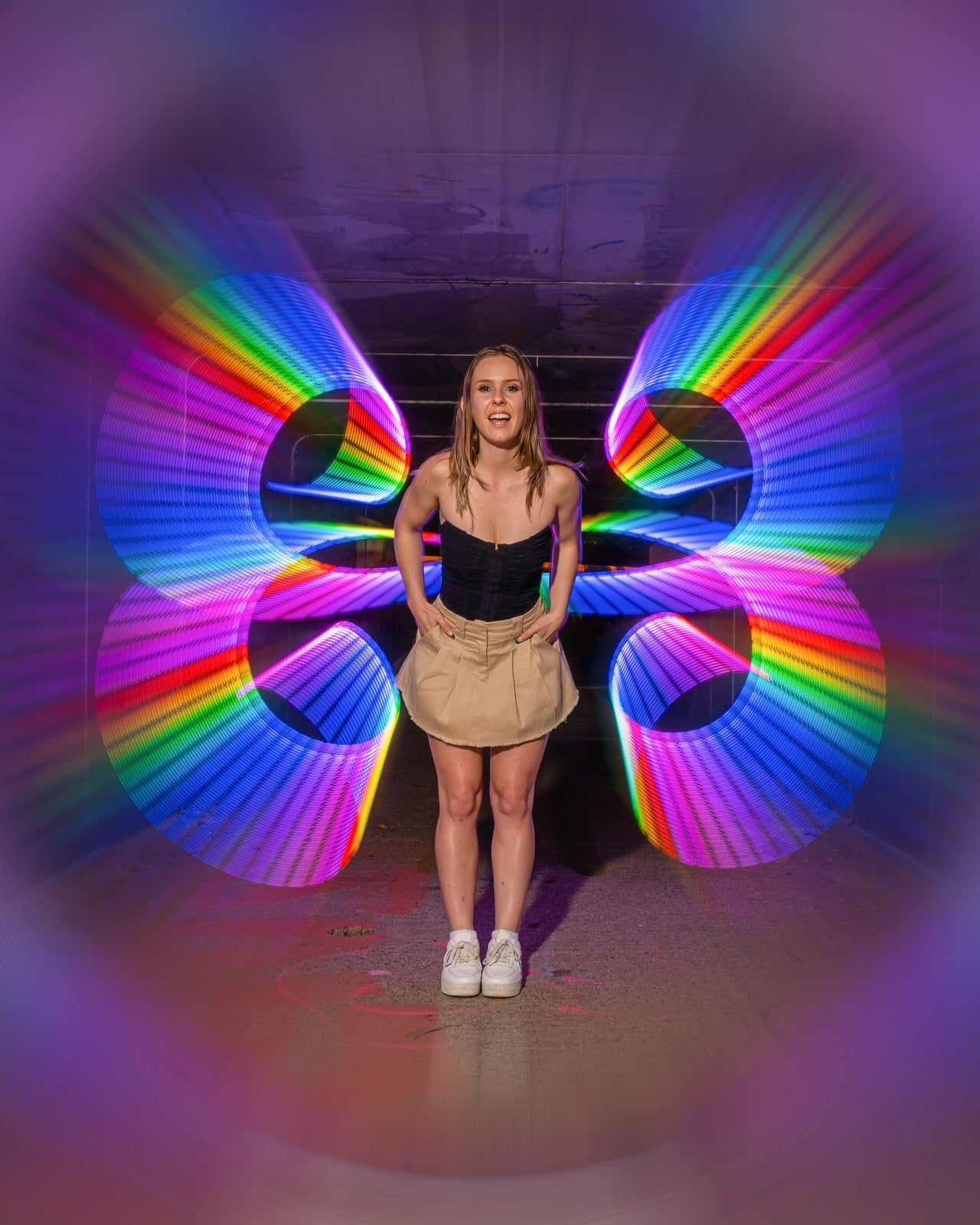 Beginner flow artist with rainbow pixel whip light trails. Photo: Stephen Knight.