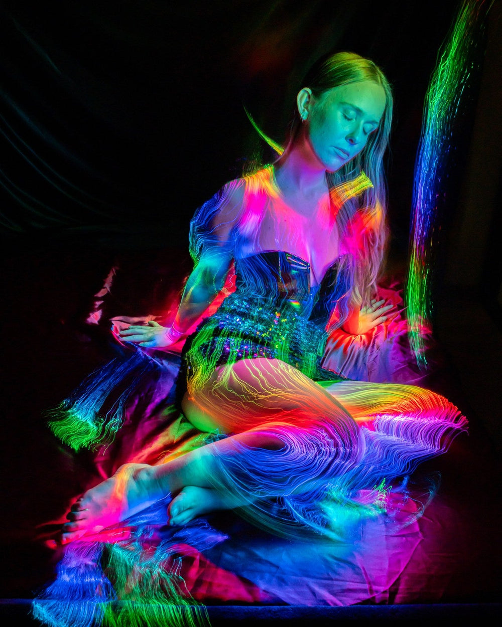 Model wearing a glowing fiber optic costume. Photo: Stephen Knight.