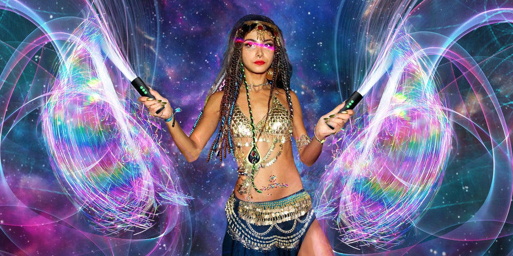 Performer holding two lit BitWhip fiber optic whips