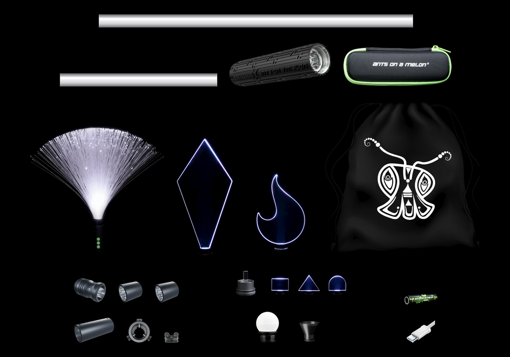 Every item in the Light Painting Starter Kit laid out to scale: flashlight, tubes, blades, duster, orb, adapters, battery, cable, travel case and bag