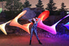 Light painting performance with rainbow light ribbons created with the RGB Critter
