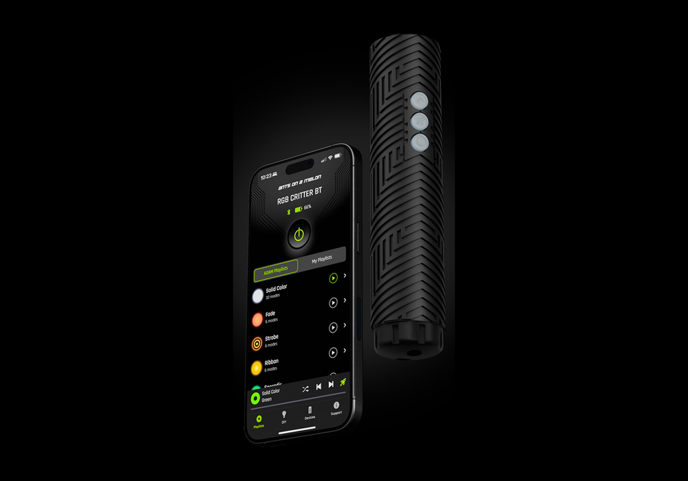 RGB Critter BT flashlight beside a phone running the Ants on a Melon app playlist screen