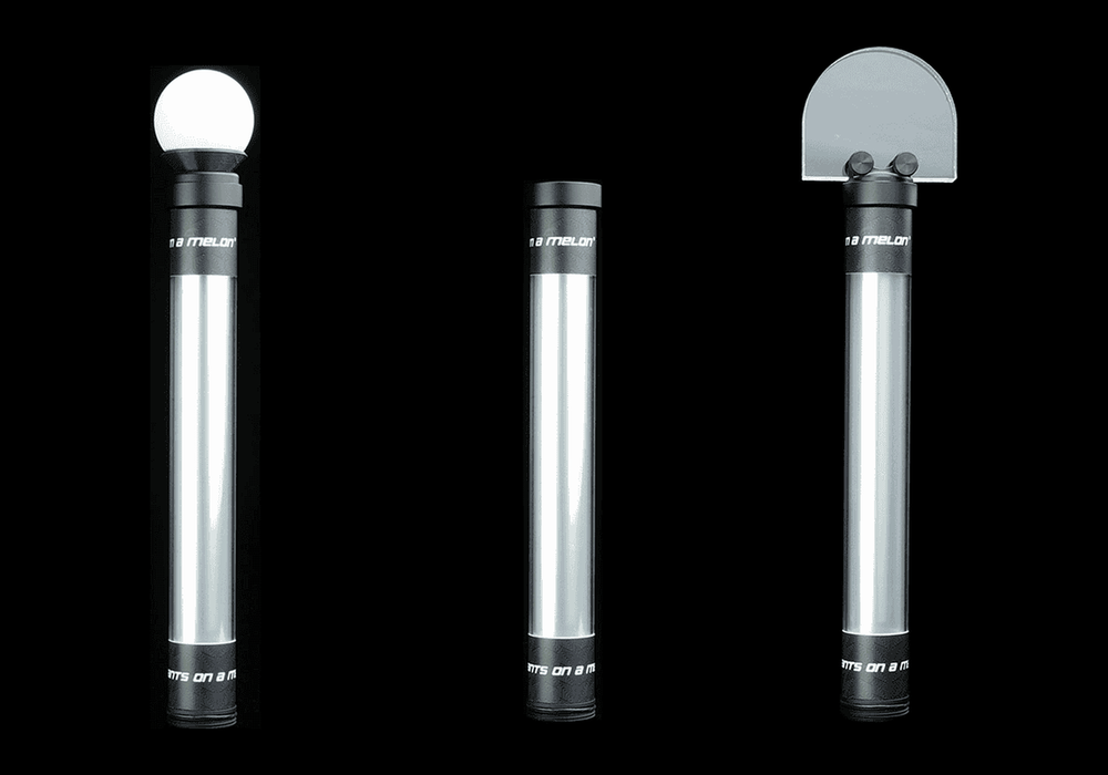 Light Painting Tube shown with three interchangeable tops: orb diffuser, plain tube and half-dome
