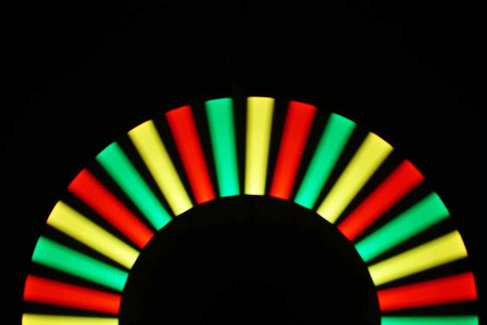 Fan of coloured light strokes from different light painting tools