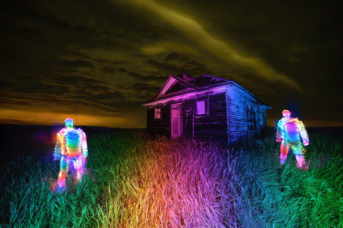 Light painted figures drawn with the Acrylic Writer outside an old farmhouse