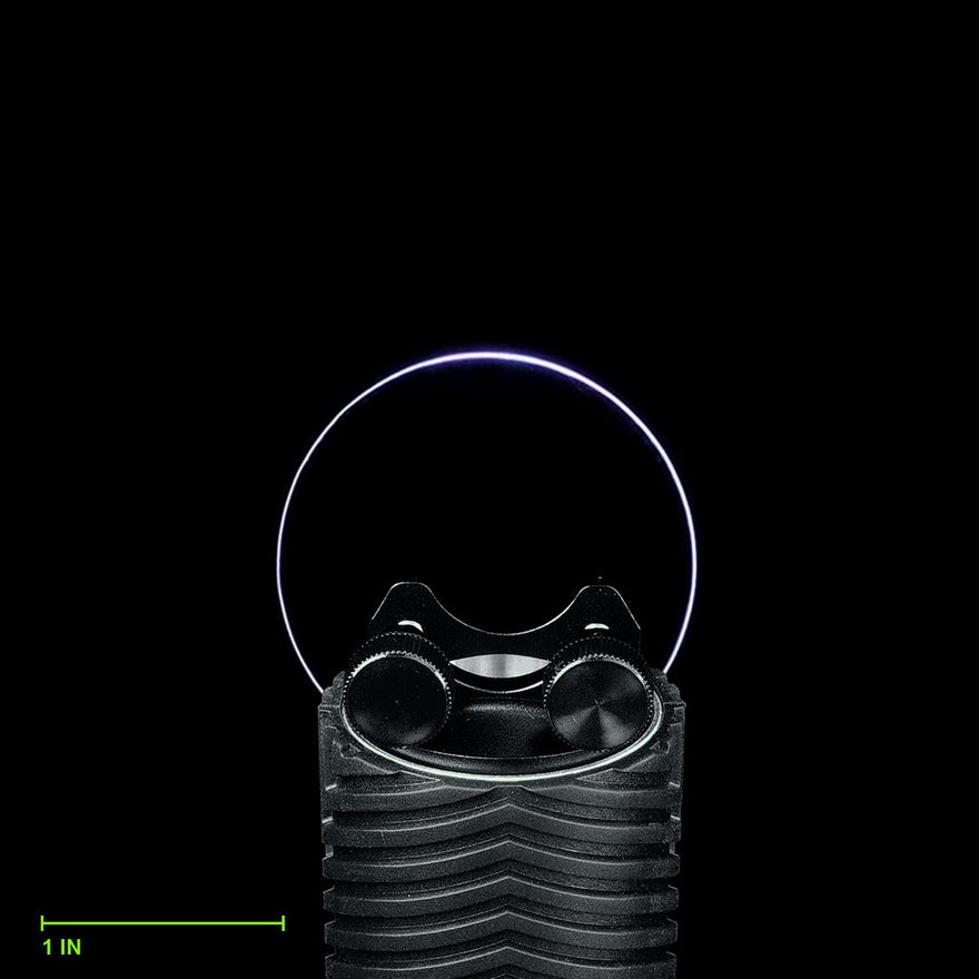 Baby Circle Blade clamped in the Light Painting Blade Holder on an RGB Critter BT flashlight, thumbscrews tightened, shown to scale. Blade is 2 in (5 cm) long