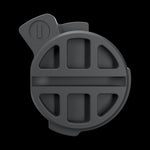 Battery Door straight on: ribbed outer face with the locking tab and its slot, on black.