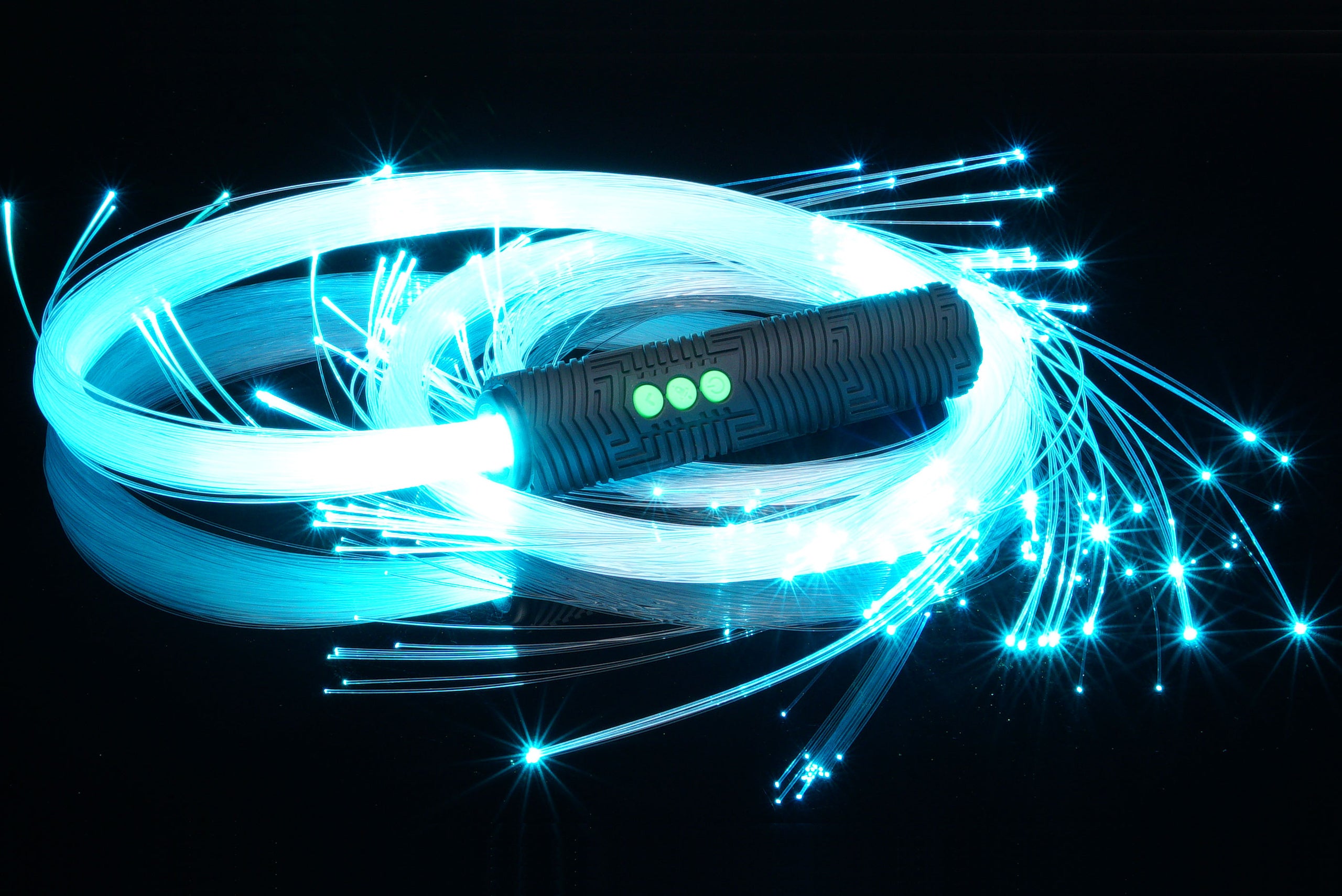BitWhip 200-fiber optic whip glowing ice blue, coiled with sparkling fiber tips