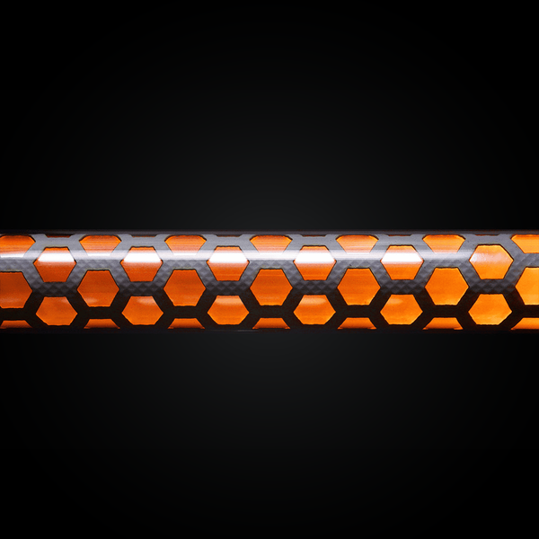 Close-up of the Honeycomb light painting tube glowing orange, side view