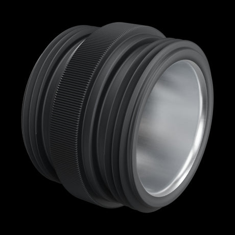 Inverse Critter Connector, three-quarter view: matte black anodized body with knurled band and polished bore, on black.
