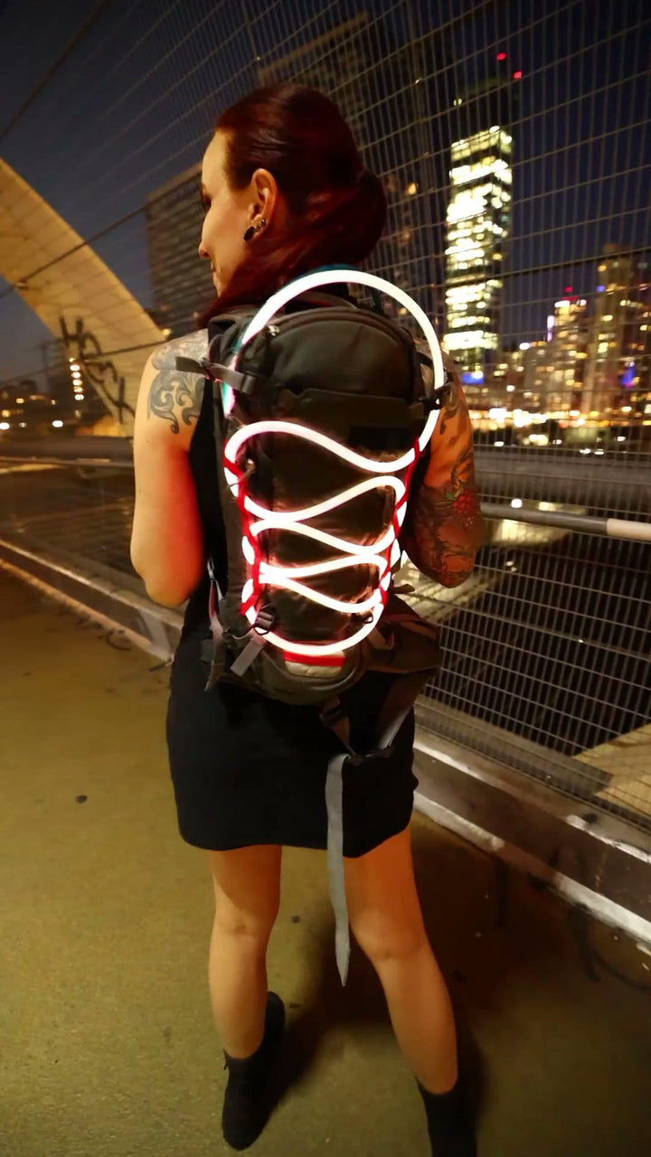 Jupiter Rope laced through a backpack worn at night