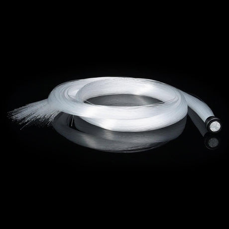 Fiber optic costume accessory shown unlit: coiled clear fiber with connector cap on black