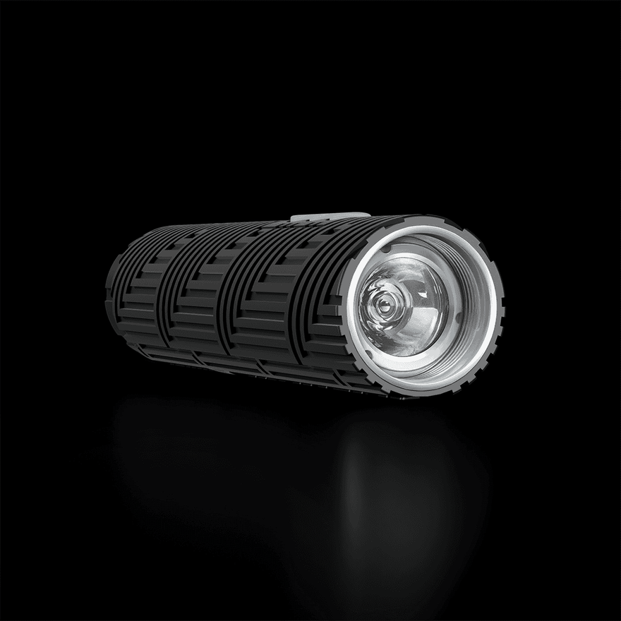 RGB Critter BT flashlight lying on its side